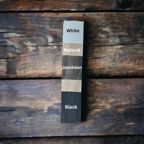 Piece of wood stained white, dark brown and black